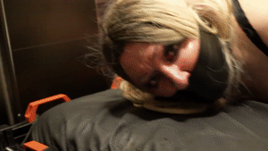 bondagecrossdresser.com - Locked Leather Hogtie on the Bondage Bed thumbnail